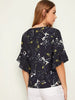 Black Botanical Print Asymmetrical Ruffle Cuff Top