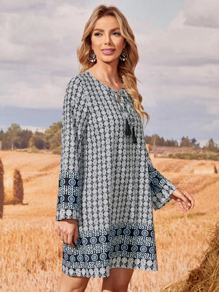 Tassel Tie Neck Allover Print Tunic Dress